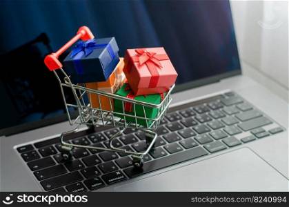 Black friday mini shopping bags in cart on the keyboard Online shopping ideas and home delivery services during the holidays.