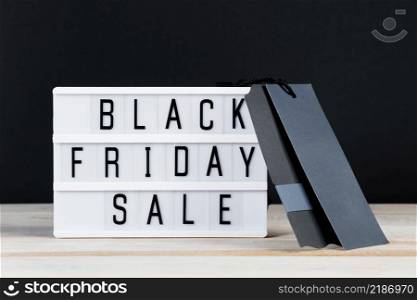 Black Friday sale. Label and lightbox on a dark background. Banner for advertising.. Black Friday sale. Label and lightbox on dark background.