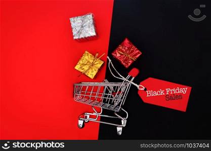 Black Friday sale, shopping cart and gift box with price tag