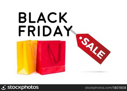 black friday sale with colored bags on white background with copy space
