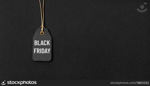 Black friday tag isolated on black background with copy space