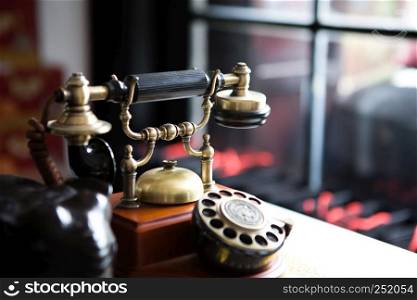 Black gold antique vintage telephone, abstract of communication