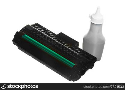 Black green cartridge and bottle of toner isolated on white. Technology equipment. Studio shot.