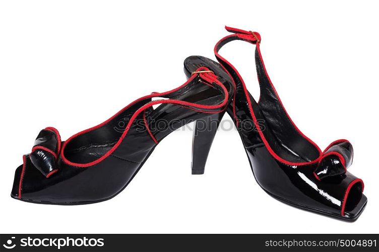 Black high heel patent leather women shoes on white background