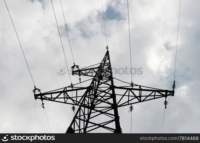 Black high mast against the blue sky