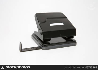 Black hole puncher on a white backgeound