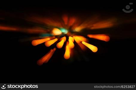 Black holiday background with bokeh blur motion lights