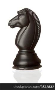 Black horse chess isolated on white background with reflection on the floor