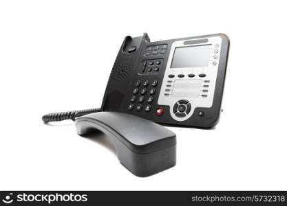 Black IP office phone isolated on white background