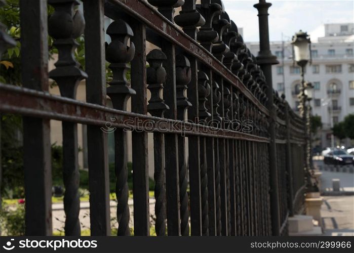 Black iron fence in close up