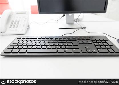 black keyboard on the desk in the office manager