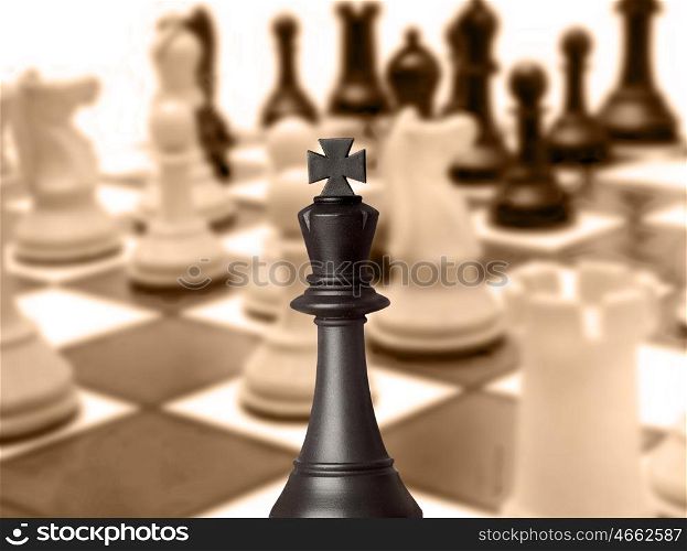 Black king chess piece in the chessboard