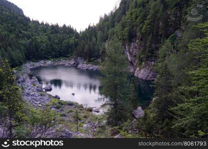 Black lake in Triglav national park in Slovenia