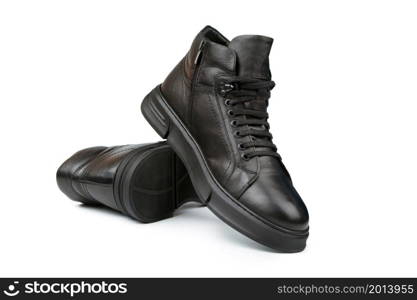 Black leather autumn sneakers for men isolated on white background