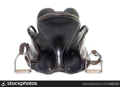 black leather saddle in front of white background