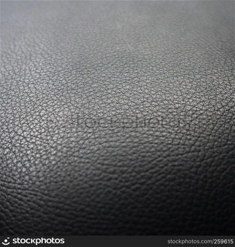 black leather sofa, pattern surface texture. Close-up of interior material for design decoration background