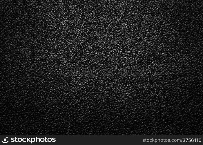 Black leather texture for background with light from above&#xA;