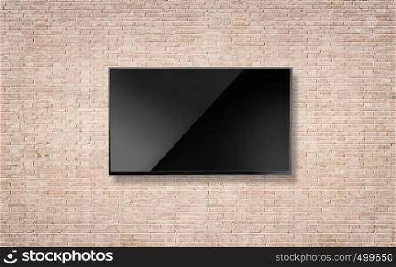 Black LED tv television screen blank on light wall background with clipping path