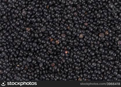 black lentils background closeup texture - macro shot