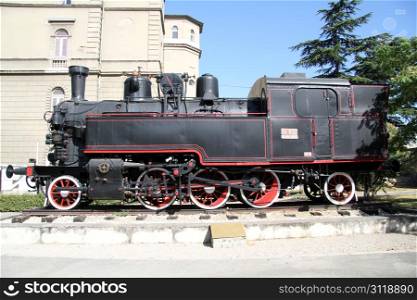 Black locomotive near the station in Rijeka, Croatia