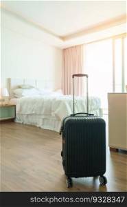 Black Luggage in modern hotel room after door opening. Baggage for Time to travel, service, journey, trip, summer holiday and vacation concepts