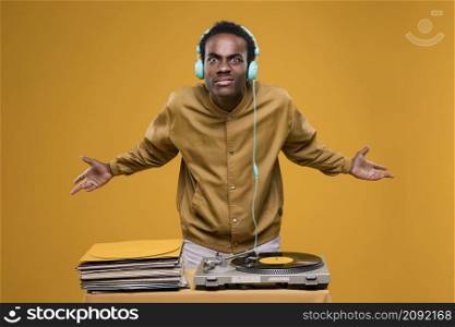black man posing with headphones