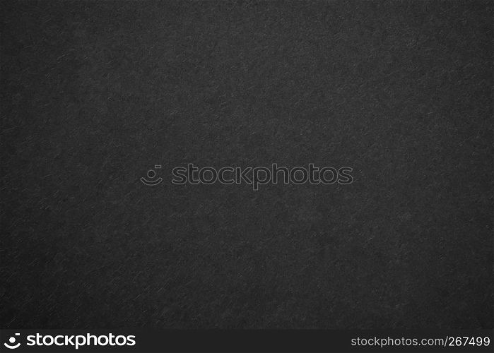 Black matte canvas with small abstract pattern detail textured background.