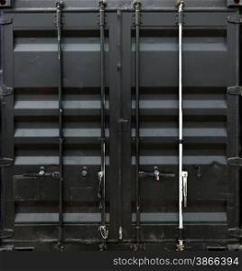 Black metal door of freight container