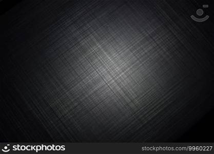 Black metal striped textured background with a light of spotlight