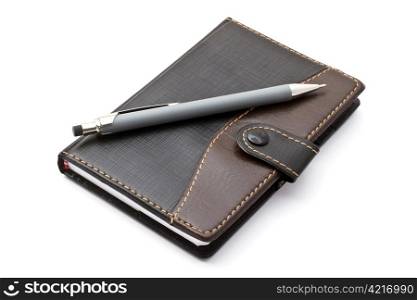 Black notebook and Mechanical pencil isolated on white