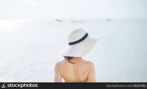 Black of beautiful woman in red swimsuit on the beach