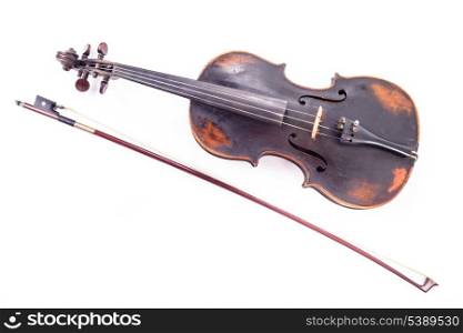 Black old violin on white