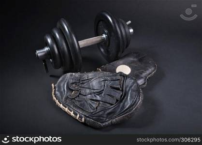 black older punch pads for boxing training on dark background