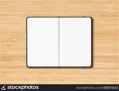 Black open lined notebook mockup isolated on wooden background. Black open lined notebook isolated on wooden background