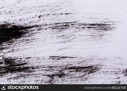 Black paint isolated on white paper background