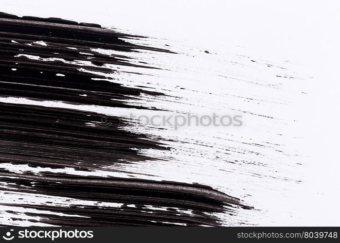 Black paint isolated on white paper background