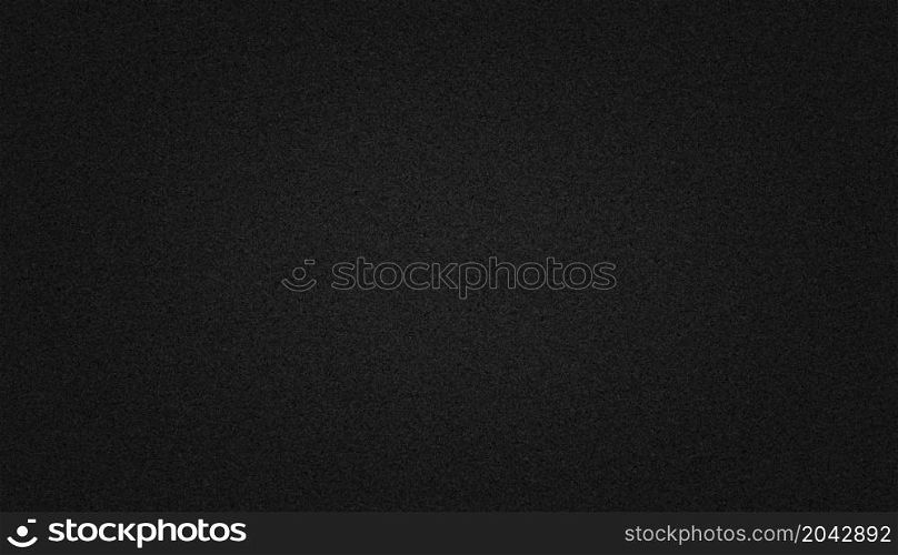 Black paper texture background with soft glowing backdrop, background texture for design