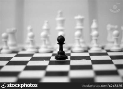 Black pawn alone againist white army