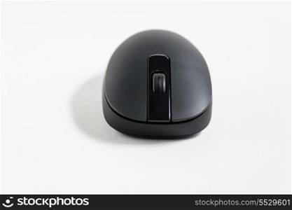 Black pc mouse on white background with shadow