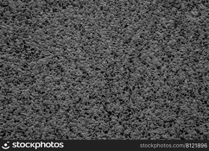 black pebble stones as a background texture