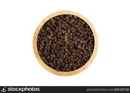 black peppercorns in wooden bowl isolated on white background with clipping path