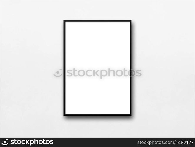 Black picture frame hanging on a white wall. Blank mockup template. Black picture frame hanging on a white wall
