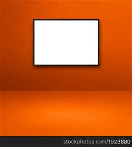 Black picture frame hanging on an orange wall. Blank mockup template. Black picture frame hanging on an orange wall