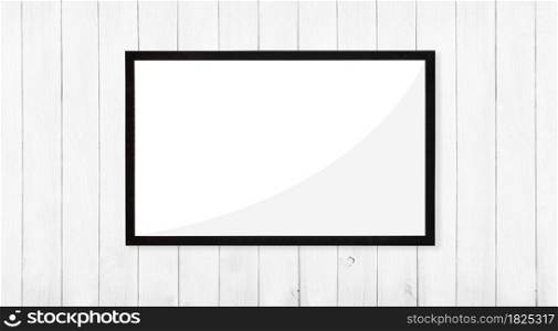 Black picture frame on white wood board texture and backgrounds. Abstract background, Blank copy space.