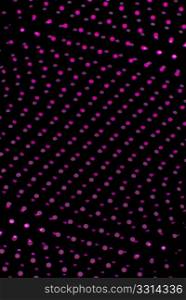 Black plastic mesh texture backlit with pink light.