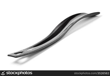 black plastic shoehorn isolated on white