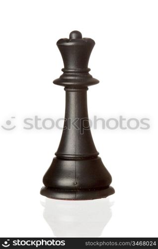 Black queen chess piece isolated on white background with reflection on the floor