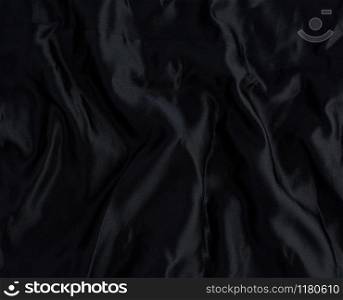 black satin textile fabric, piece of fabric for sewing curtains and things, full frame