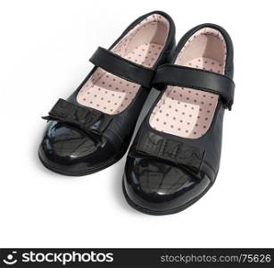 Black shine leather girl shoes isolated on white with clipping path