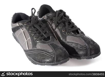 black shoes in front of white background